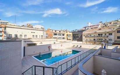 Swimming pool of Flat for sale in Granollers  with Air Conditioner, Parquet flooring and Storage room