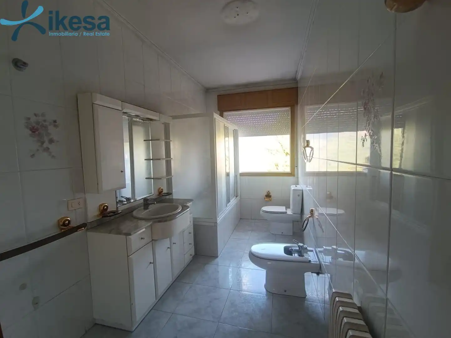 Bany de Casa o xalet en venda en Entrimo amb Jardí privat