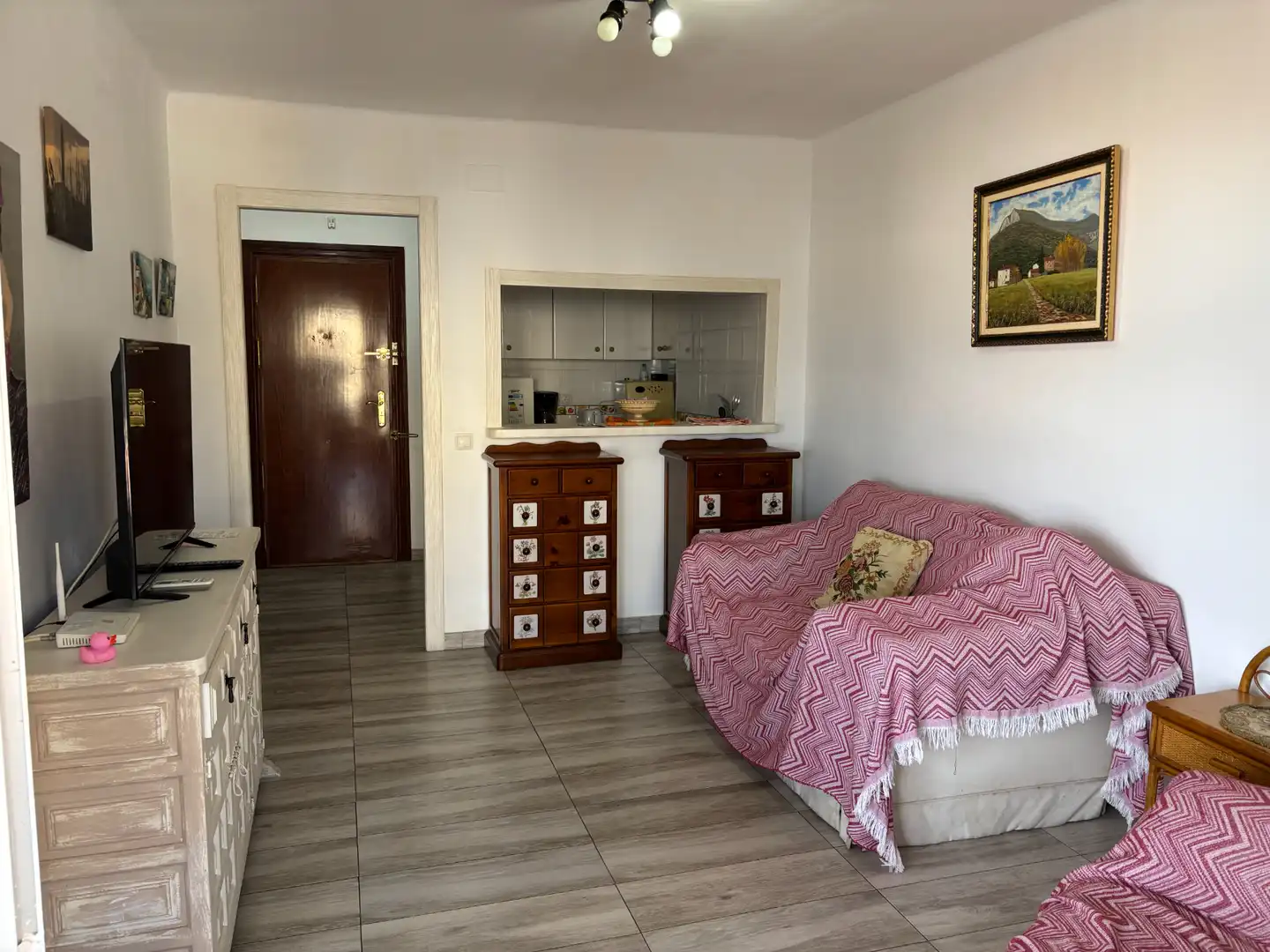 Sala d'estar de Apartament en venda en Torrox amb Aire condicionat, Terrassa i Moblat