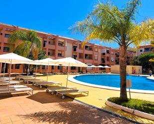 Piscina de Apartament de lloguer en Punta Umbría amb Aire condicionat, Calefacció i Jardí privat