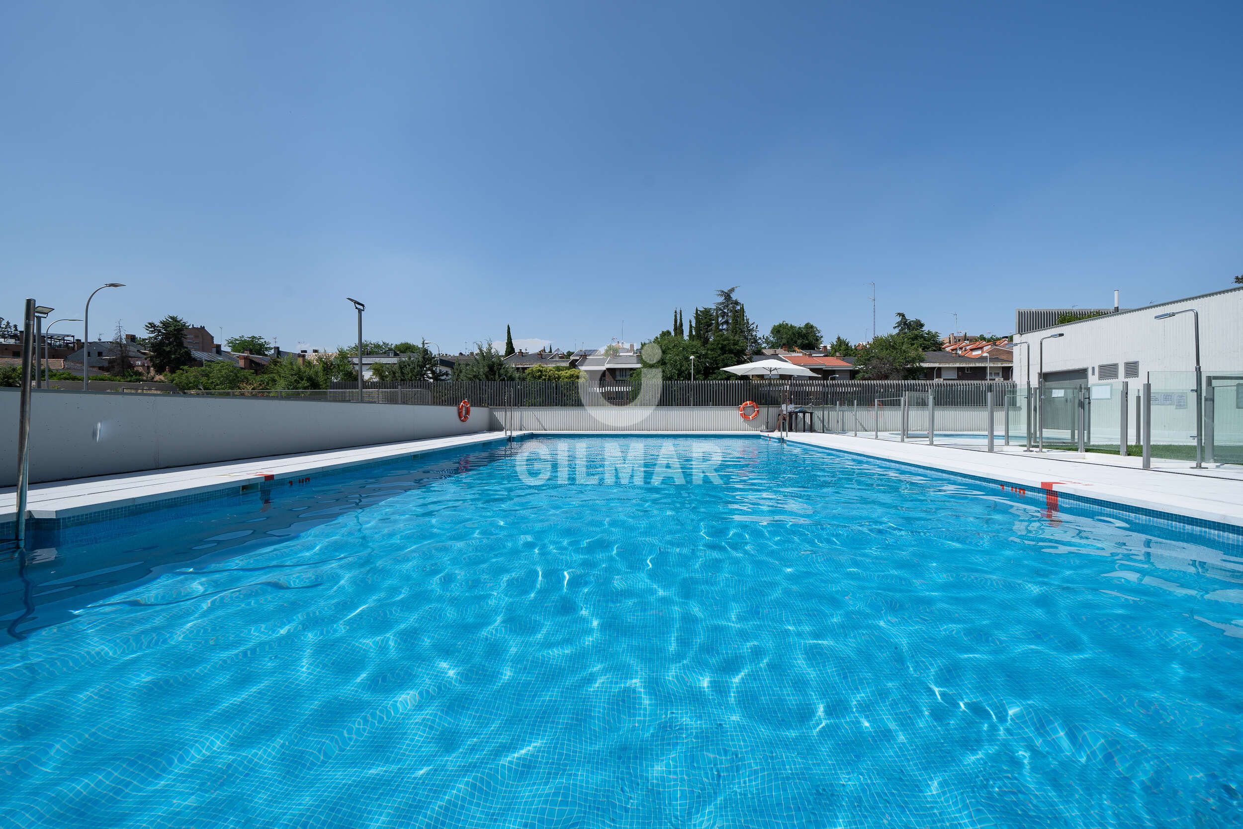Swimming pool of Flat for sale in  Madrid Capital  with Heating, Private garden and Storage room