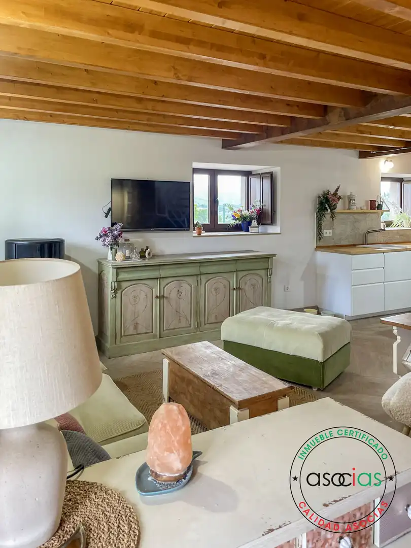 Sala d'estar de Casa adosada en venda en Villaviciosa amb Calefacció i Jardí privat