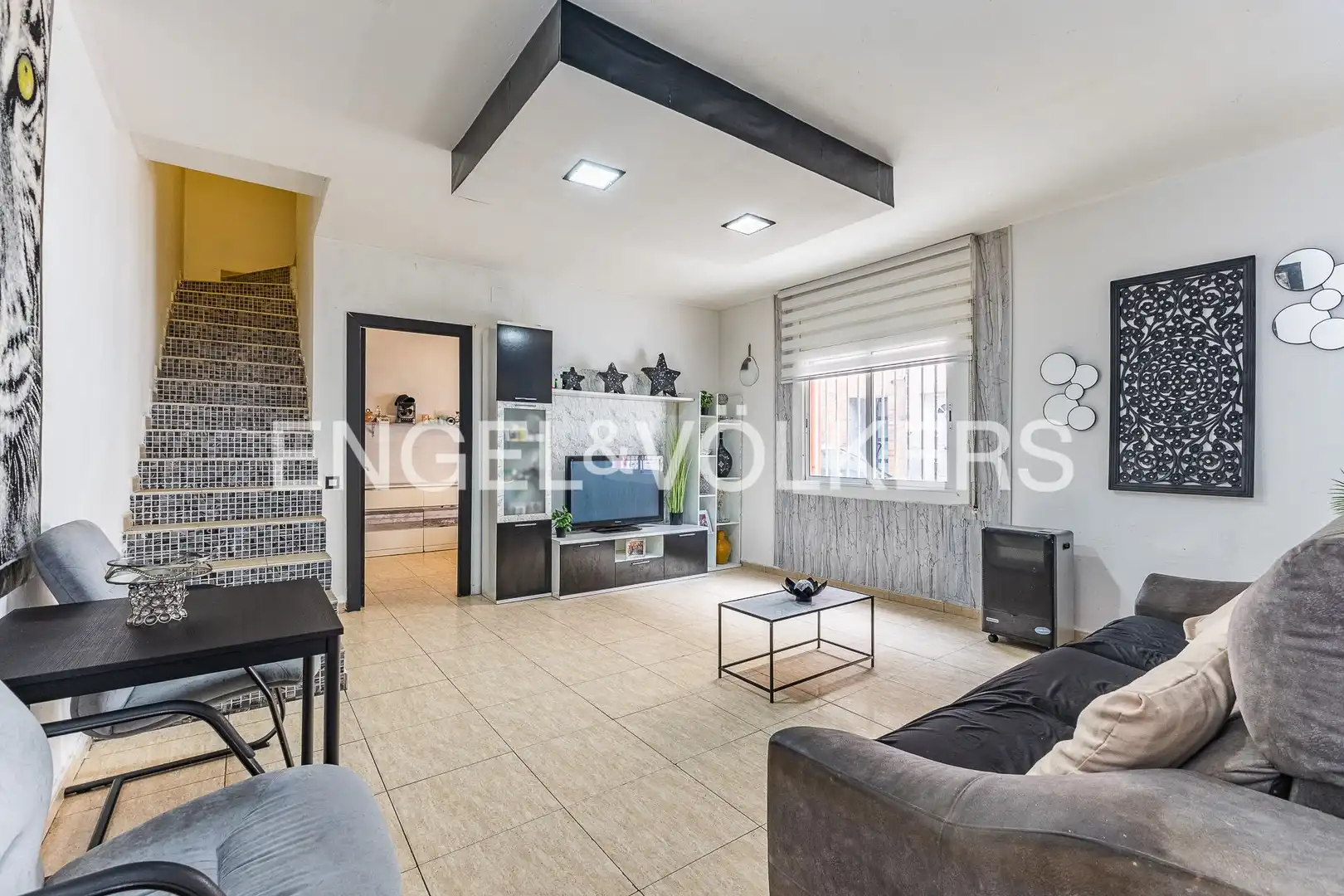 Sala de estar de Casa adosada en venta en Sabadell con Aire acondicionado, Calefacción y Terraza