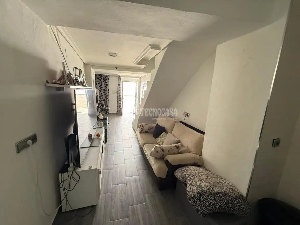 Sala de estar de Casa adosada en venta en Martos con Terraza