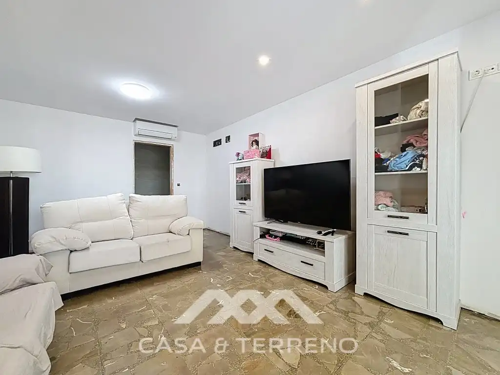 Sala d'estar de Casa o xalet en venda en Vélez-Málaga amb Aire condicionat, Jardí privat i Terrassa