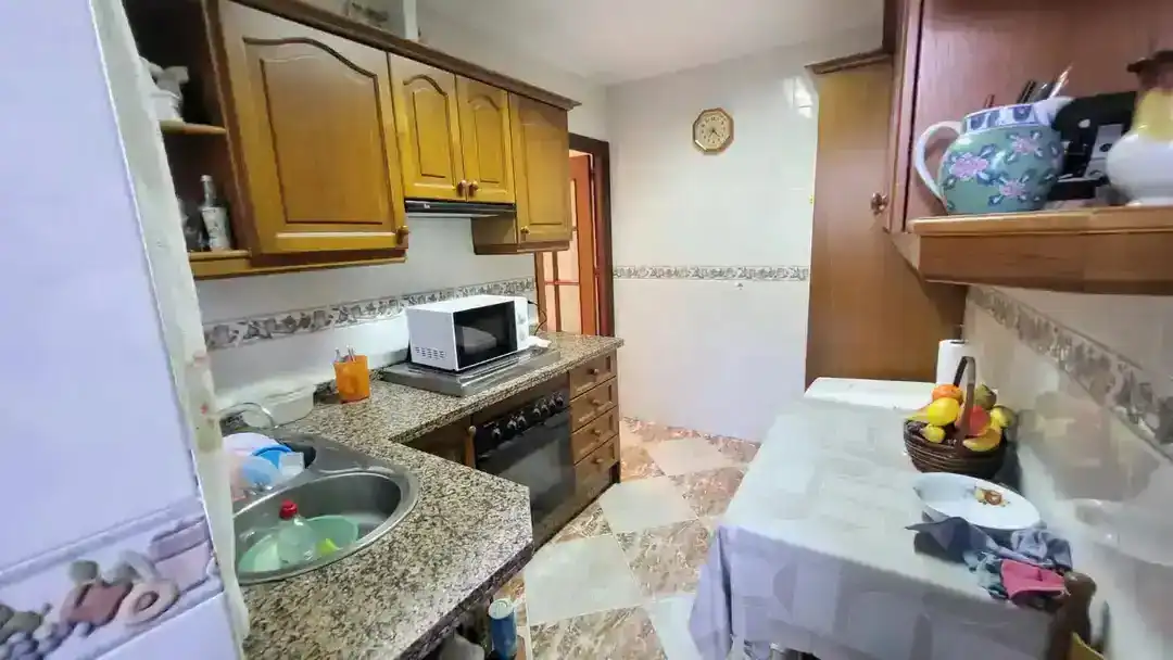 Cuina de Casa adosada en venda en Rincón de la Victoria amb Aire condicionat, Terrassa i Traster