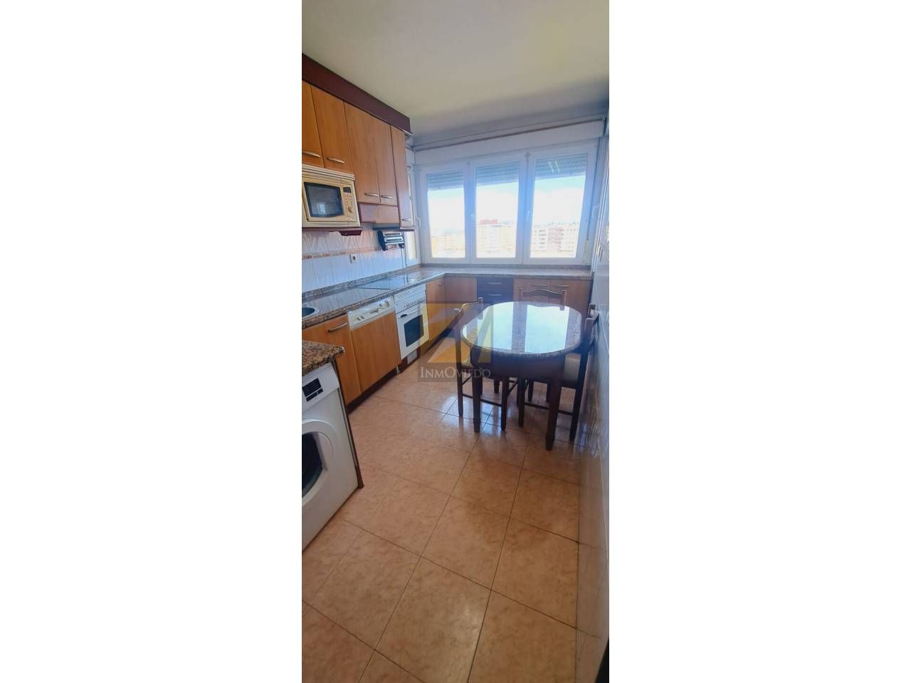 Kitchen of Flat for sale in Oviedo   with Heating, Parquet flooring and Storage room