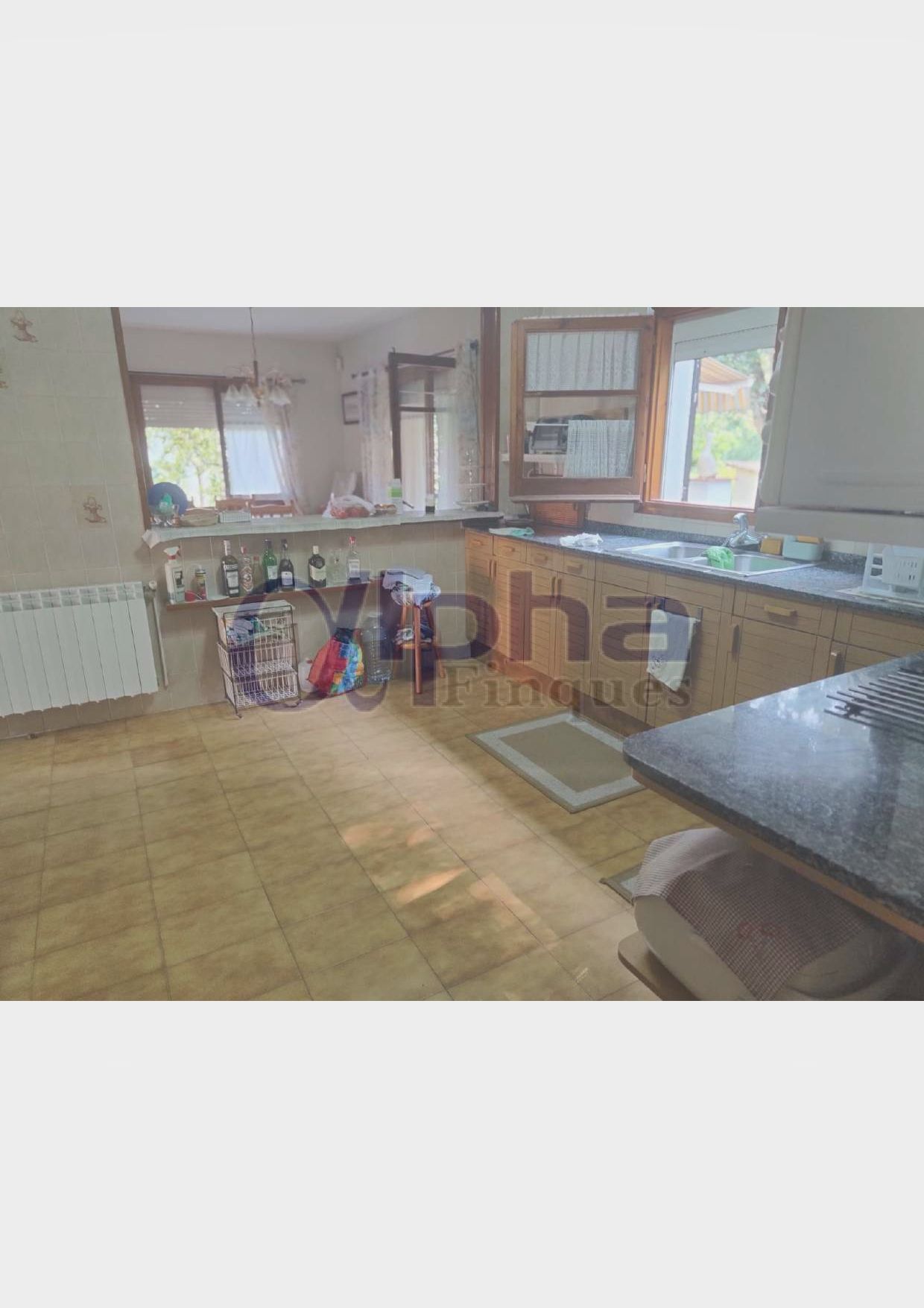 Küche von Haus oder Chalet zum verkauf in Riells i Viabrea mit Klimaanlage, Heizung und Privatgarten