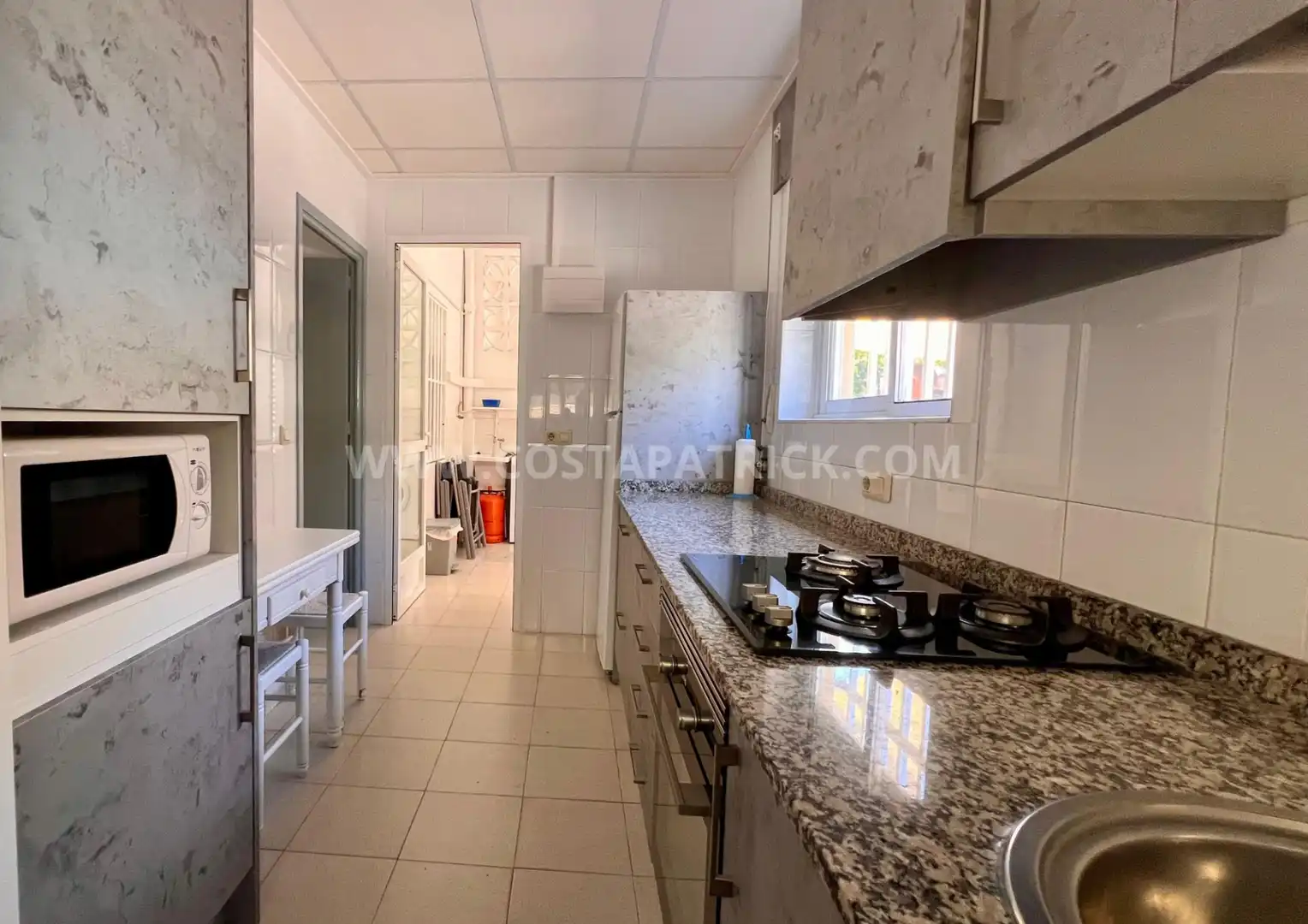 Cocina de Casa adosada de alquiler en Los Alcázares con Aire acondicionado, Jardín privado y Terraza
