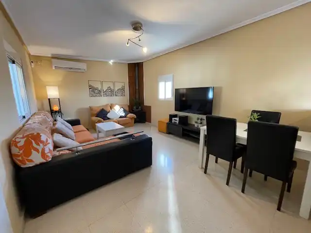 Sala d'estar de Casa o xalet en venda en Alicante / Alacant amb Aire condicionat, Calefacció i Jardí privat