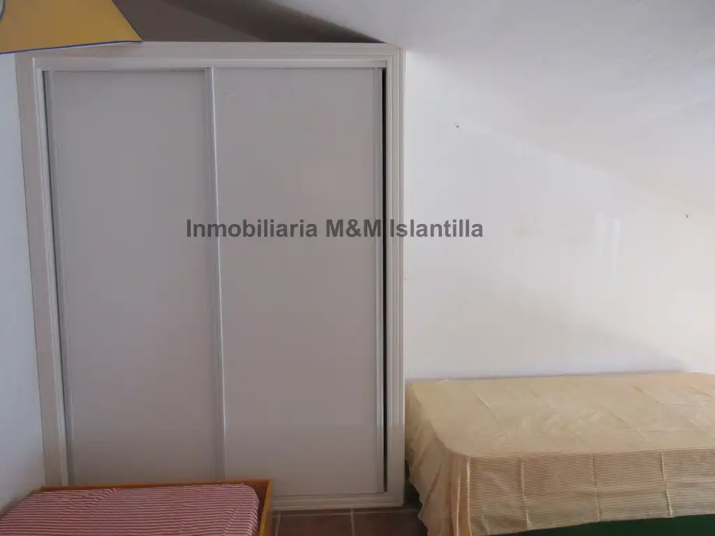 Habitación de Casa adosada en venta en Islantilla con Terraza, Trastero y Amueblado
