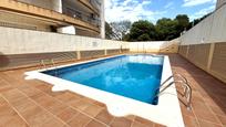 Swimming pool of Flat for sale in Calafell  with Air Conditioner, Heating and Terrace