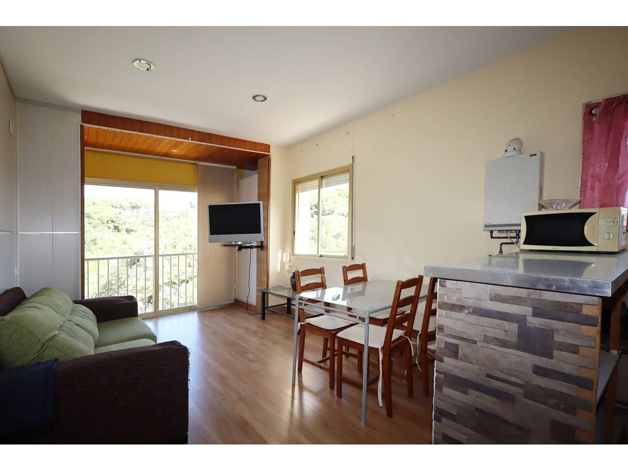 Living room of Apartment for sale in Lloret de Mar  with Heating, Parquet flooring and Furnished
