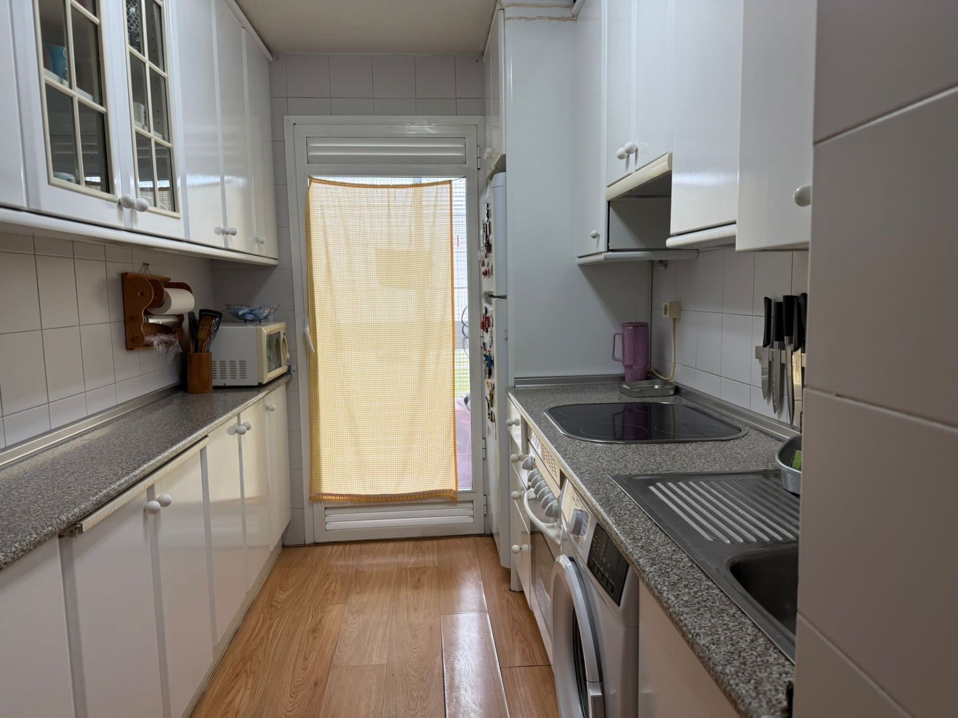 Cuina de Dúplex en venda en Alcalá de Henares amb Calefacció, Terrassa i Piscina comunitària