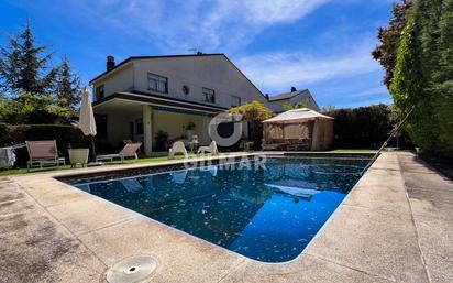 Swimming pool of Single-family semi-detached for sale in Moralzarzal  with Swimming Pool