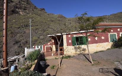 Exterior view of House or chalet for sale in Santiago del Teide  with Private garden, Storage room and Furnished