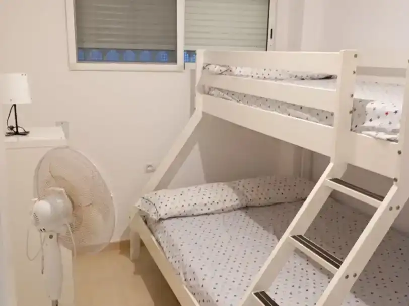 Dormitori de Pis de lloguer en Moncofa amb Aire condicionat, Piscina i Balcó