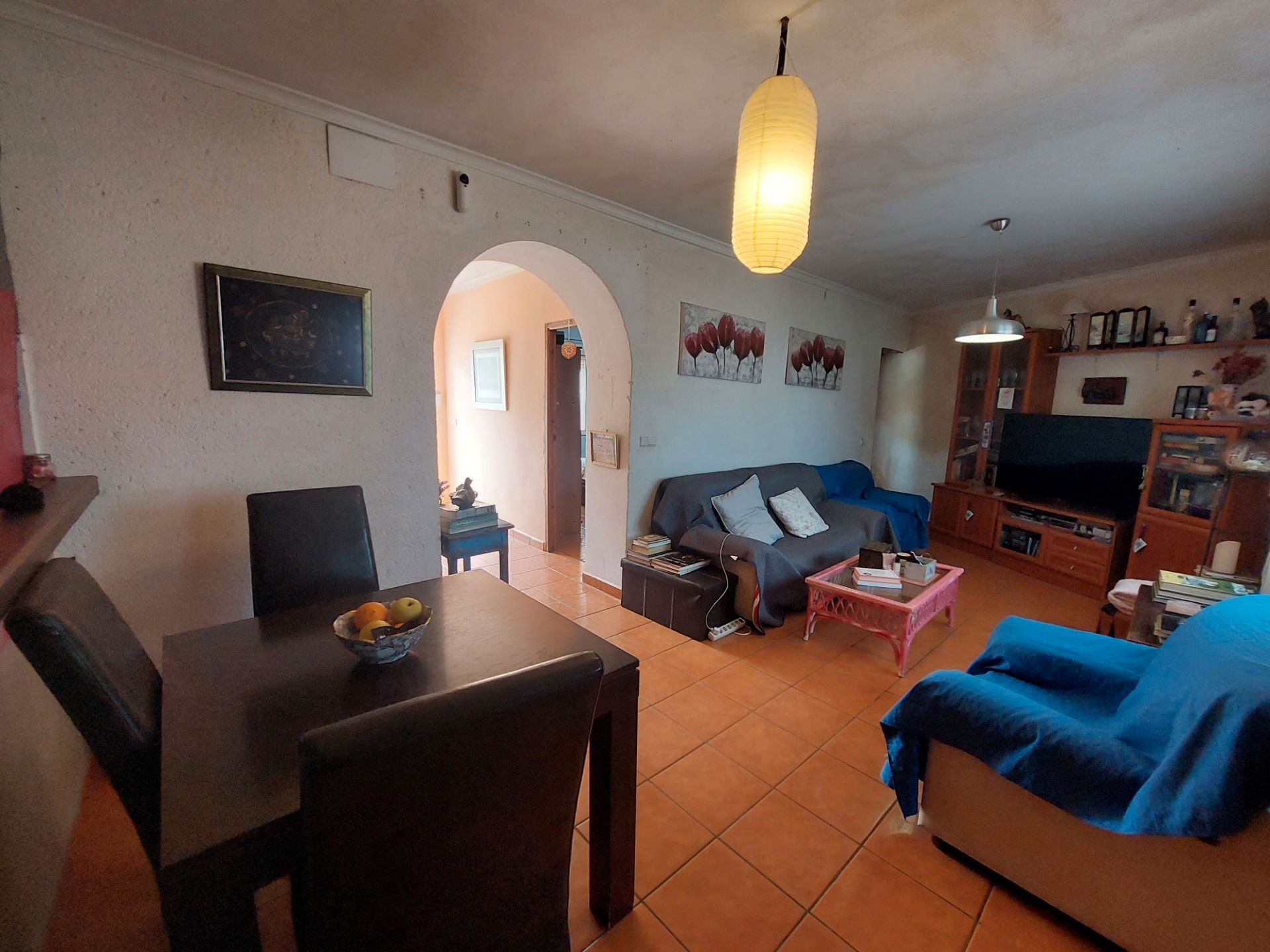 Sala d'estar de Casa adosada en venda en Dénia amb Jardí privat i Moblat