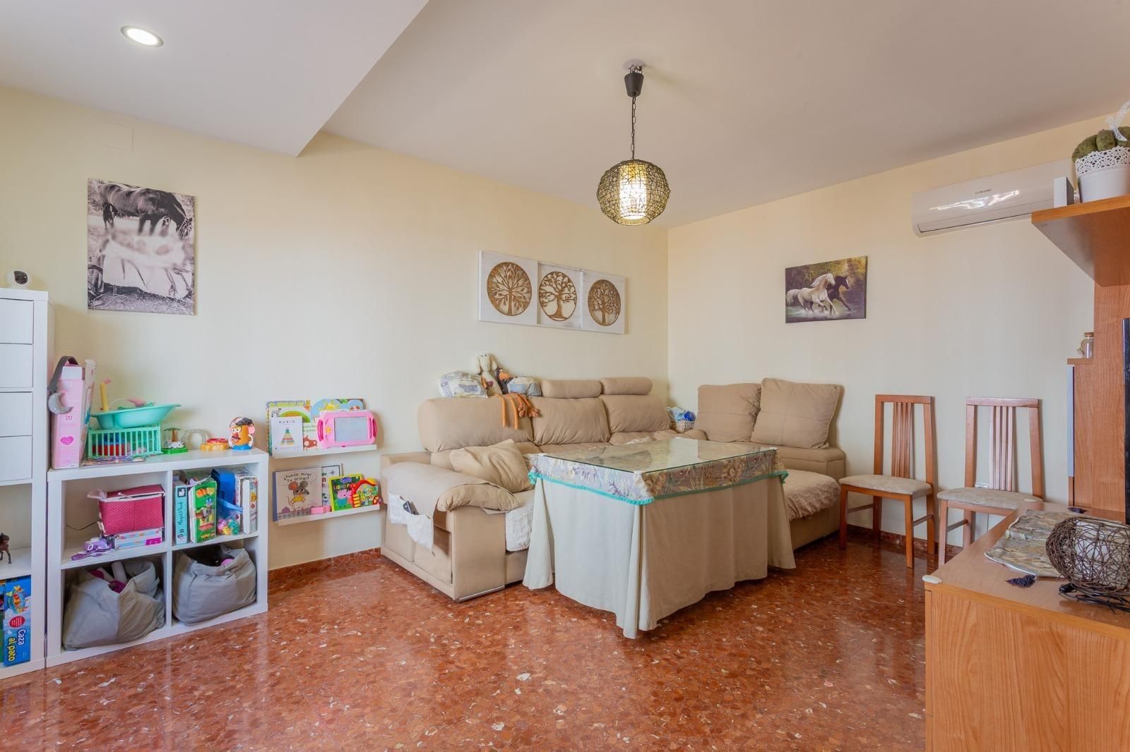 Sala de estar de Casa adosada en venta en Peligros con Aire acondicionado, Calefacción y Terraza