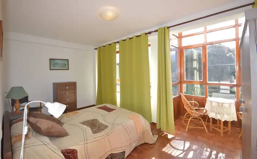 Habitación de Apartamento de alquiler en Llanes con Jardín privado, Terraza y Amueblado