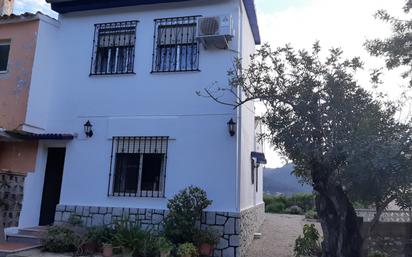 Exterior view of House or chalet for sale in Alzira  with Swimming Pool