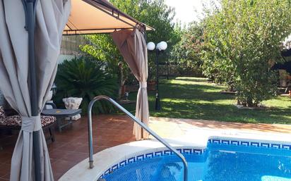 Swimming pool of House or chalet for sale in La Pobla de Montornès    with Air Conditioner, Private garden and Terrace