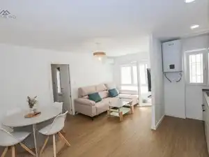 Sala d'estar de Pis de lloguer en Almuñécar amb Aire condicionat, Terrassa i Moblat