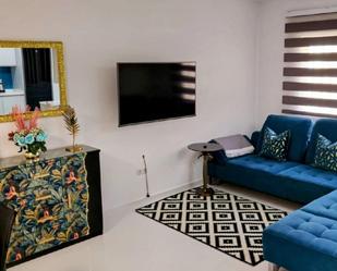 Sala d'estar de Casa adosada de lloguer en L'Alfàs del Pi amb Aire condicionat i Terrassa