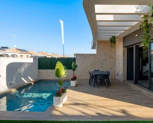 Swimming pool of House or chalet for sale in Los Montesinos  with Air Conditioner, Private garden and Swimming Pool