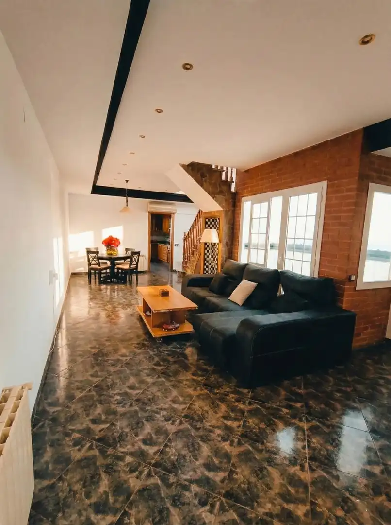 Sala d'estar de Casa o xalet en venda en Calella amb Aire condicionat, Terrassa i Traster