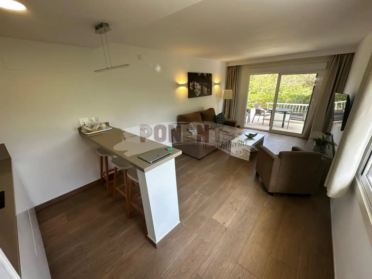 Sala d'estar de Apartament en venda en Sant Josep de sa Talaia amb Aire condicionat, Terrassa i Moblat
