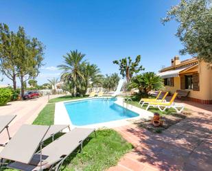 Jardí de Casa o xalet de lloguer en Dénia amb Aire condicionat, Terrassa i Piscina