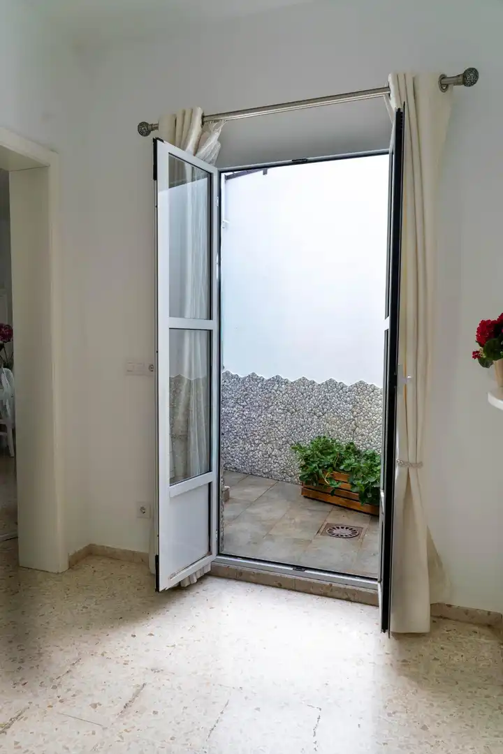 Balcony of Houses for sale in Carrión de los Céspedes  with Air Conditioner and Heating