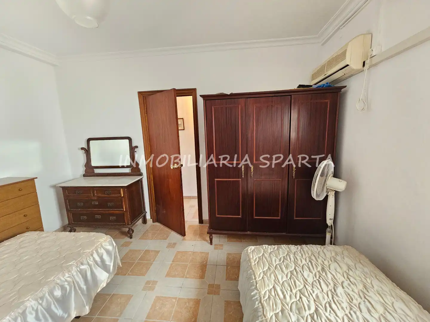Habitación de Casa adosada en venta en Santiponce con Terraza, Trastero y Balcón