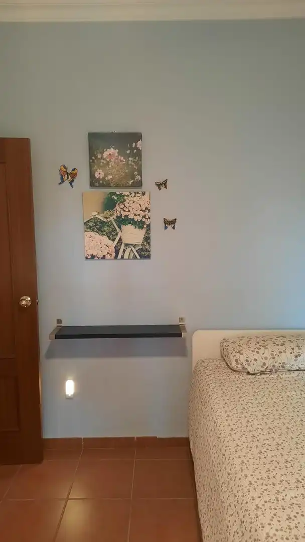 Sala d'estar de Casa adosada en venda en El Puerto de Santa María amb Aire condicionat, Jardí privat i Terrassa