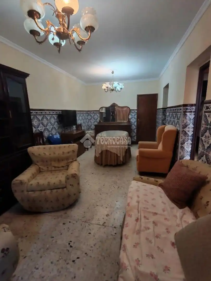 Sala d'estar de Casa adosada en venda en Marchena