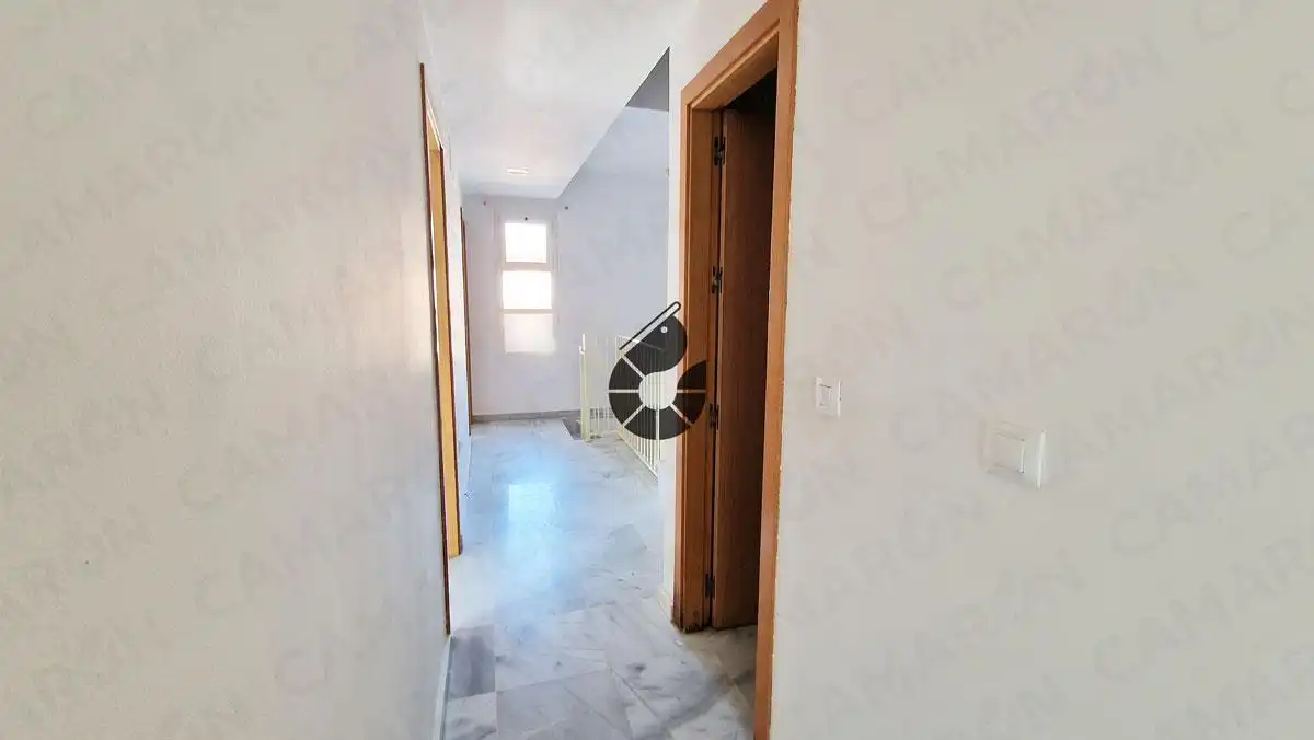 Casa adosada en venda en Coria del Río amb Jardí privat, Terrassa i Alarma