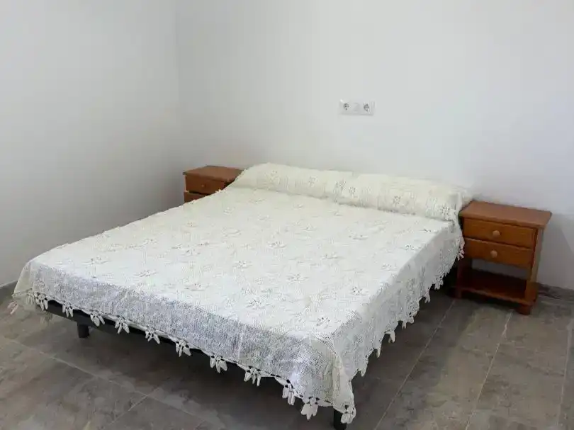Dormitori de Casa o xalet de lloguer en Muro amb Aire condicionat i Piscina
