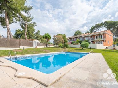 Swimming pool of Single-family semi-detached for sale in Cunit  with Heating, Private garden and Terrace