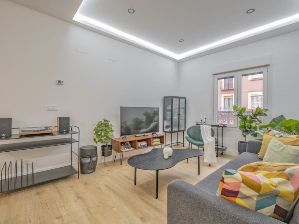Sala d'estar de Apartament en venda en  Madrid Capital amb Aire condicionat, Moblat i Forn