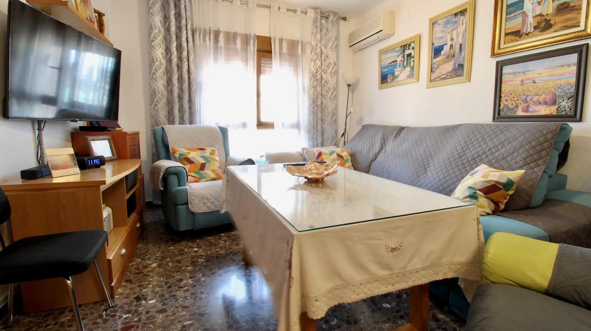 Sala de estar de Casa adosada en venta en Vegas del Genil con Aire acondicionado, Calefacción y Terraza