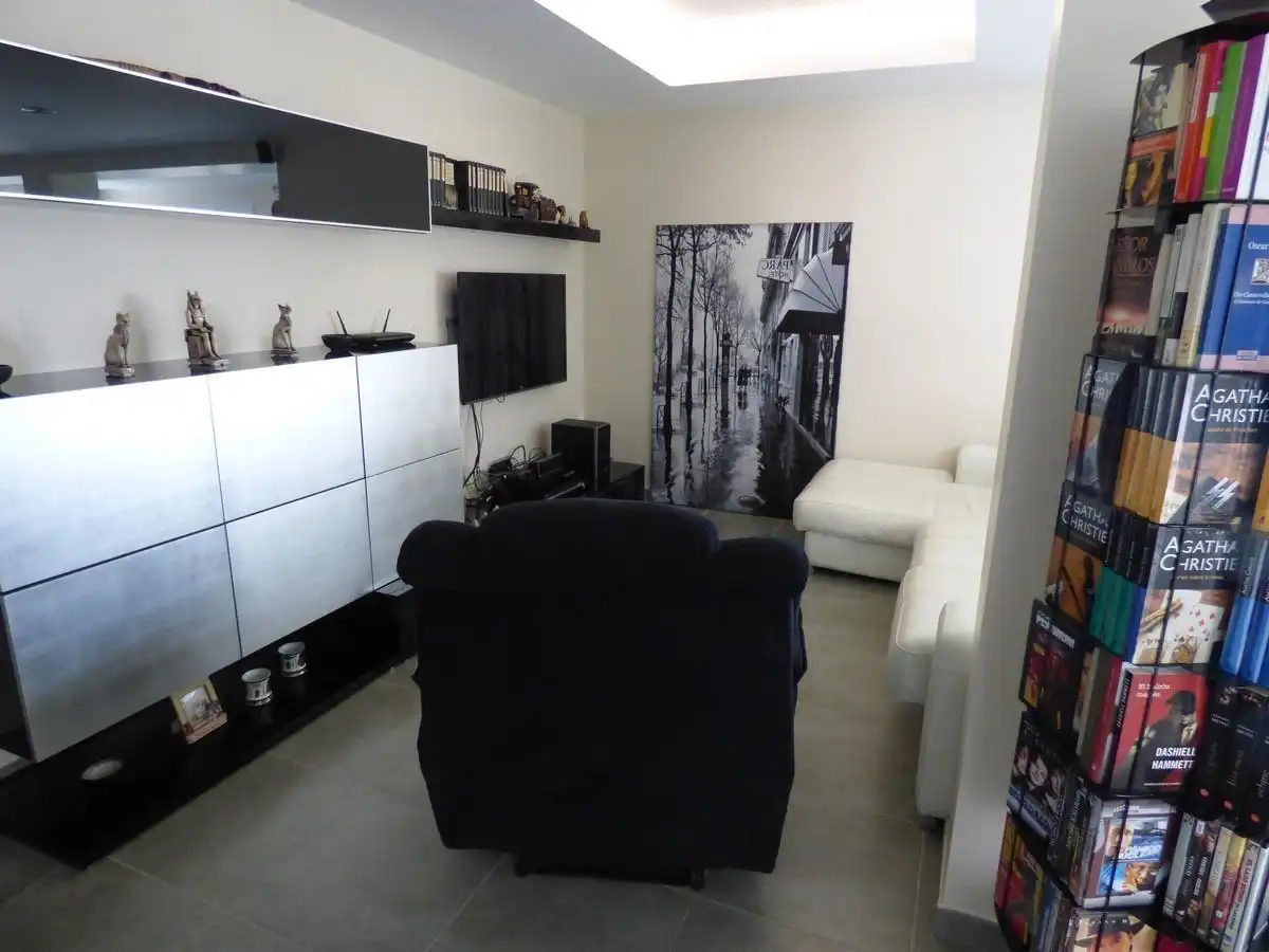 Sala d'estar de Casa adosada en venda en Alicante / Alacant amb Aire condicionat, Calefacció i Jardí privat