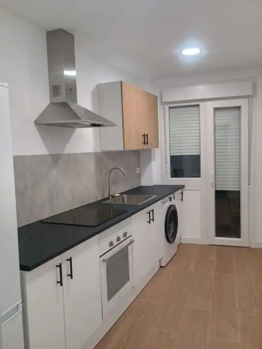 Kitchen of Flat for share in Ourense Capital   with Heating, Furnished and Balcony