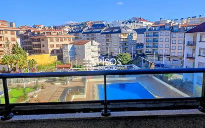 Swimming pool of Apartment for sale in Sanxenxo