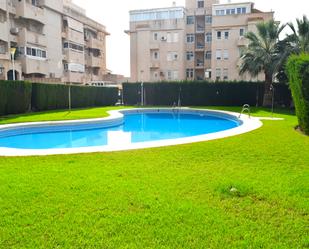 Swimming pool of Flat for sale in Roquetas de Mar  with Air Conditioner, Heating and Terrace