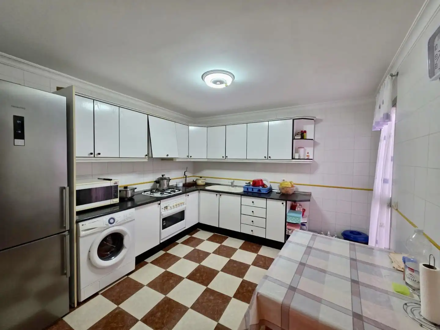 Cocina de Casa adosada en venta en Lora del Río con Aire acondicionado y Trastero