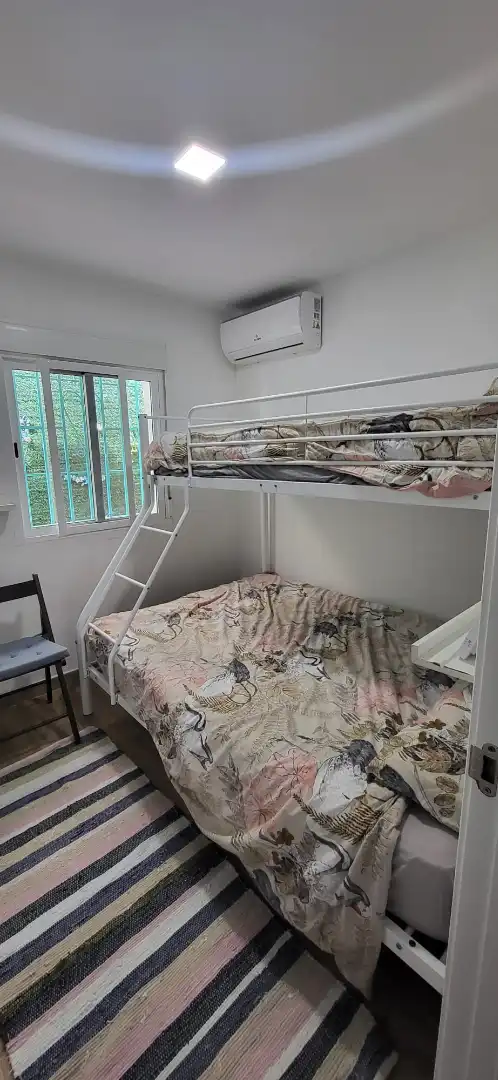 Dormitori de Casa adosada en venda en Vélez-Málaga amb Aire condicionat, Terrassa i Moblat