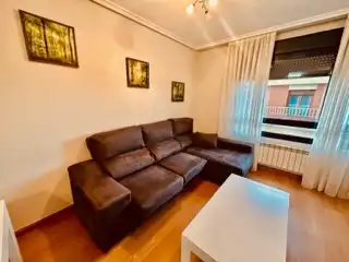 Sala de estar de Apartamento de alquiler en Villaquilambre con Calefacción, Parquet y Terraza