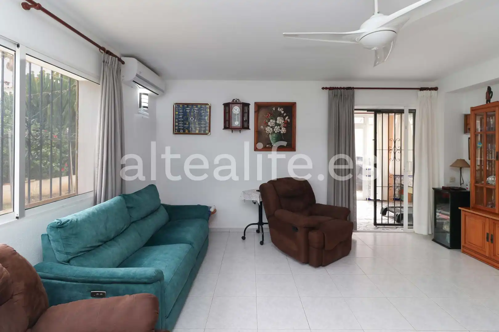 Living room of Houses for sale in L'Alfàs del Pi  with Air Conditioner, Private garden and Terrace