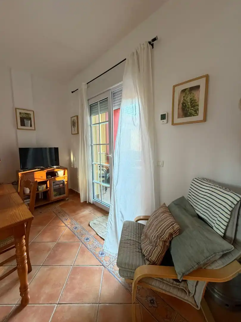 Sala de estar de Casa adosada en venta en Islantilla con Jardín privado, Terraza y Trastero